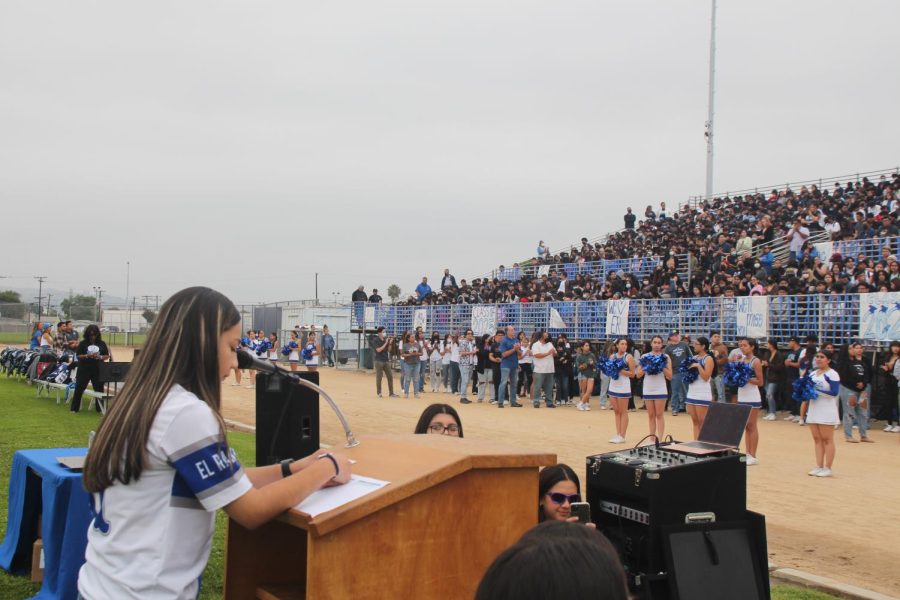 Leilani Patino recognizing the team captains for every sport on campus.